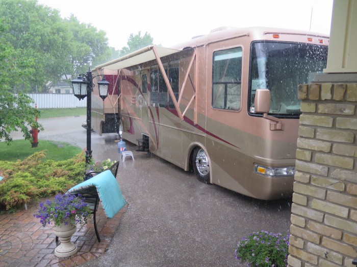 The rain was fierce for long periods of time and then would stop and the sky would clear and 15 minutes later we had very heavy rain once again.  This went on all day.  But then it got worse when the thunder began.  Of course Carmeh went crazy.  I believe Colin took this shot. 