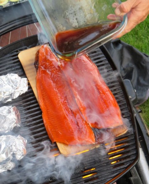 It was the perfect evening to cool up a wild sockeye fillet or two.  Colin marinates it for a few hours in his special sauce and then later pours the remainder of the liquid over the fish.