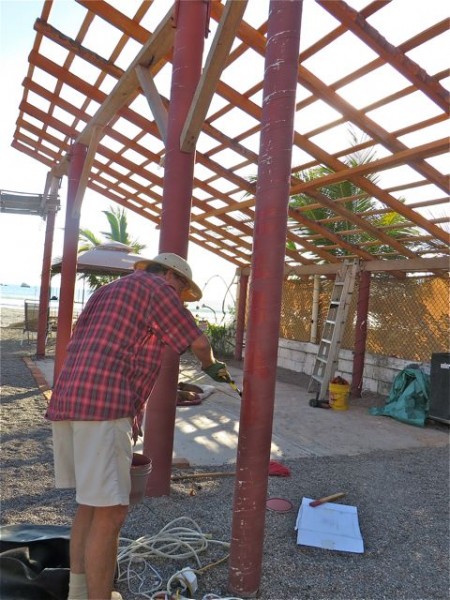 Meanwhile Colin was touching up our other cement posts with left over paint from 5 years ago.