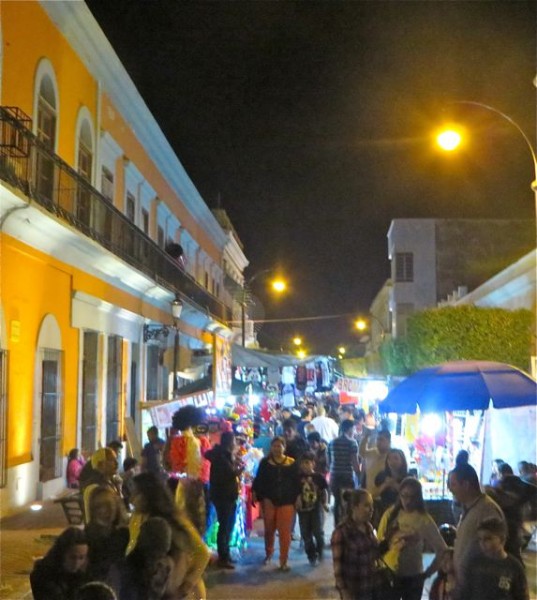 After dinner we went for a stroll and discovered a side street full of vendors.  This year one had to pass through a metal detector to enter the PLazuela the 