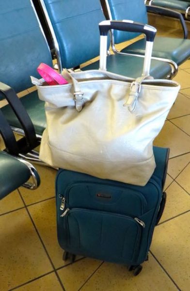 Finally we have arrived and only five minutes late. I love my new carry on bag. That pink you see peaking out is my purse which I have stowed in my tote so that i have a choice to use once I am ready to roll.